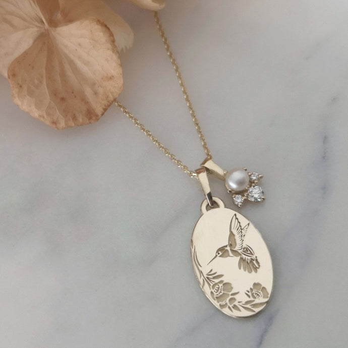 Hummingbird necklace, vintage style oval pendant with diamonds and pearl charm