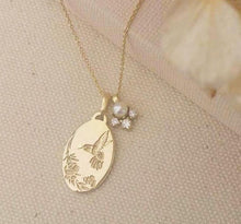 Hummingbird necklace, vintage style oval pendant with diamonds and pearl charm