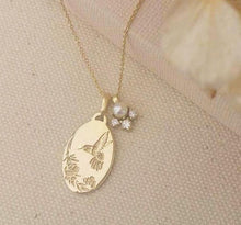 Hummingbird necklace, vintage style oval pendant with diamonds and pearl charm